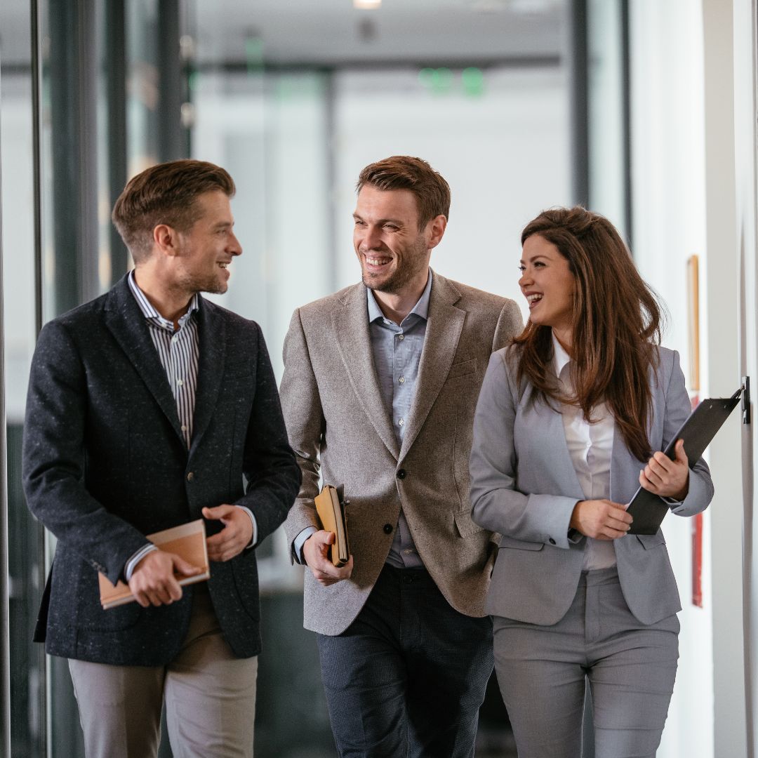 business colleagues walking down a hallway
