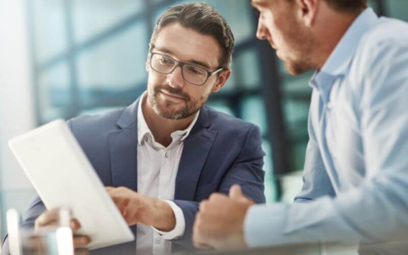 professionals looking at paperwork
